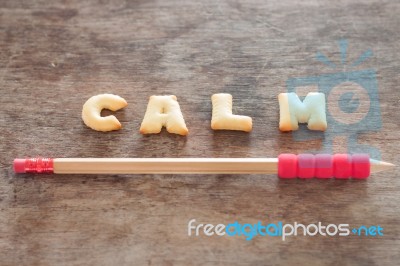 Calm Alphabet Biscuit On Wooden Table Stock Photo