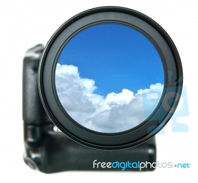 Camera Lens With Blue Sky Stock Photo