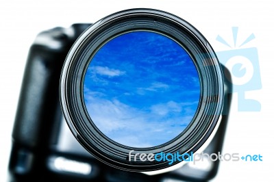 Camera Lens With Blue Sky Stock Photo