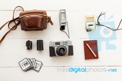 Camera, Sheath, Flash, Light Meter And Vintage Camera Stock Photo