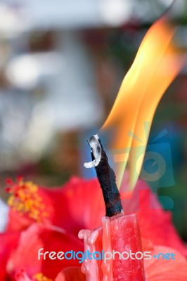 Candle And Fire In The Temple Stock Photo