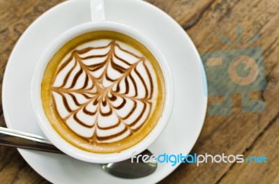 Cappuccino Coffee On The Wood Stock Photo