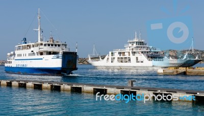 Car Ferries Leaving And Entering  Palau Port Sardinia Stock Photo