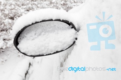 Car Mirror Filled With Snow Stock Photo