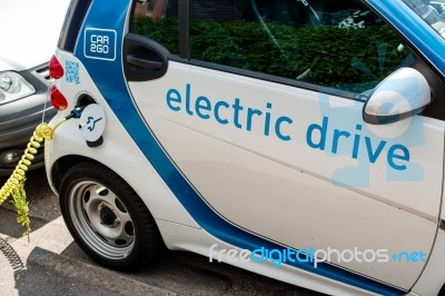 Car-sharing Electric Smart Is Being Recharged Stock Photo