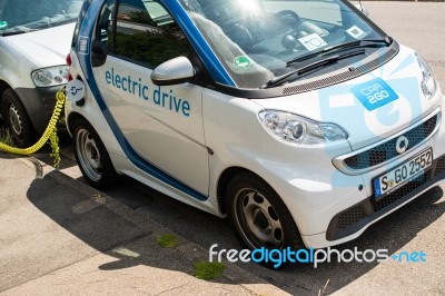 Car-sharing Electric Smart Is Being Recharged Stock Photo