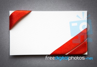 Card With Red Ribbons Bows Stock Photo