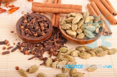 Cardamom Pods And Cloves Stock Photo