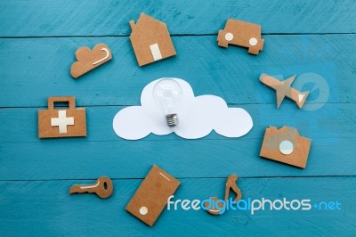 Cardboard Web Icons  And White Cloud And A Light Bulb Stock Photo