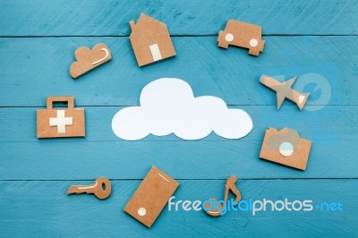 Cardboard Web Icons  And White Cloud On Blue Background Stock Photo