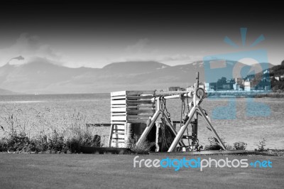 Cargo Loader Machine In Tromso Port Background Stock Photo