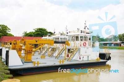 Cargo Ships In Industrial Port Stock Photo