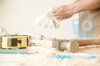 Carpenter Working,hammer,meter And Screw-driver On Construction Background Stock Photo