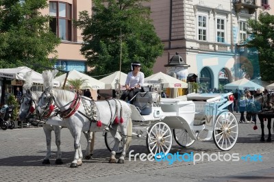 Carriage And Horses In Krakow Stock Photo