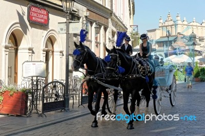 Carriage And Horses In Krakow Stock Photo