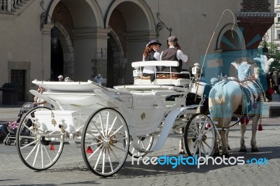 Carriage And Horses In Krakow Stock Photo