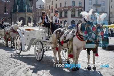 Carriage And Horses In Krakow Stock Photo