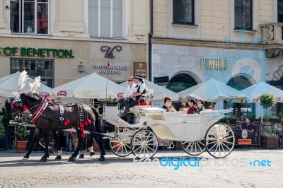 Carriage And Horses In Krakow Stock Photo