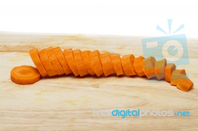 Carrot Sliced On A Cutting Board Stock Photo