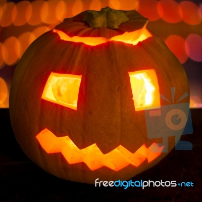 Carved Lit Halloween Pumpkin Stock Photo