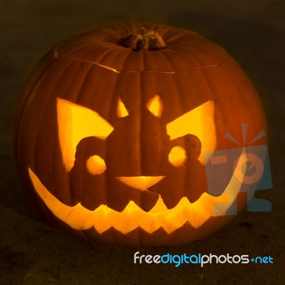 Carved Lit Halloween Pumpkin Stock Photo