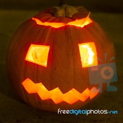 Carved Lit Halloween Pumpkin Stock Photo