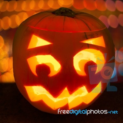 Carved Lit Halloween Pumpkin Stock Photo