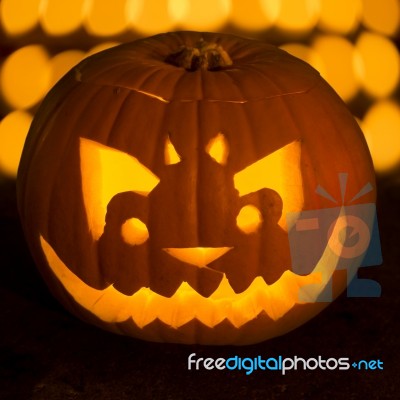 Carved Lit Halloween Pumpkin Stock Photo