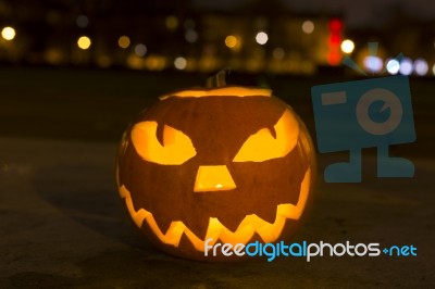 Carved Lit Halloween Pumpkin Stock Photo