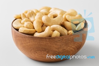 Cashew Nut In Wooden Bowl Stock Photo