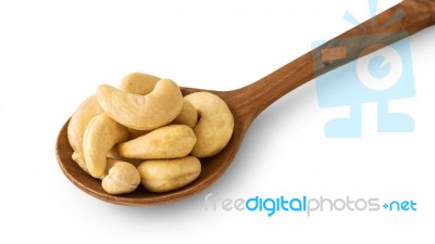 Cashew Nut On Wooden Spoon Stock Photo