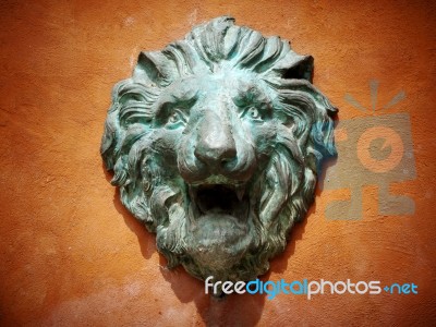 Cast Green Metal Lion Head Stock Photo