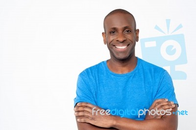 Casual African Male With Arms Crossed Stock Photo