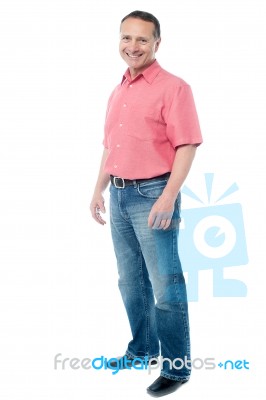 Casual Aged Man Standing Over White Stock Photo