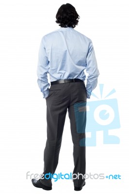 Casual Businessman Facing The Wall Stock Photo