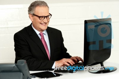 Casual Businessman Typing On Keyboard Stock Photo