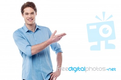 Casual Cool Guy Pointing Away Stock Photo