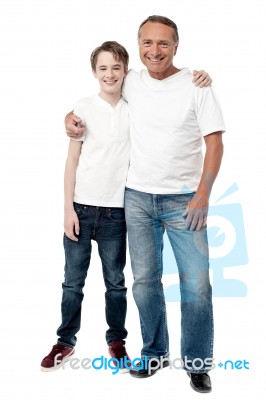 Casual Full Length Shot Of A Father And Son Stock Photo