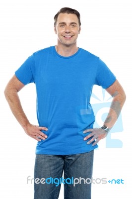 Casual Guy Posing, Hands On His Waist Stock Photo