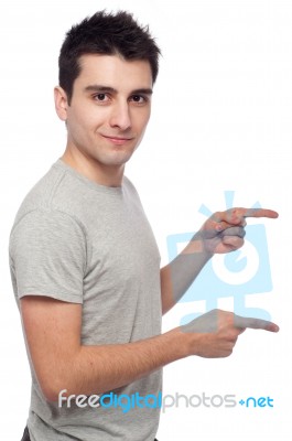 Casual Man Pointing Stock Photo