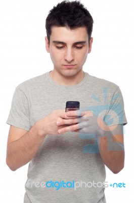 Casual Man Text Messaging Stock Photo