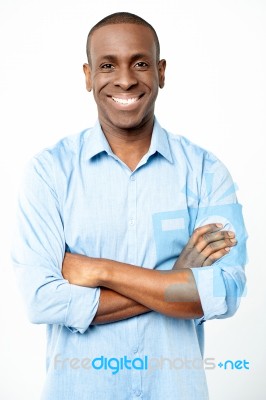 Casual Man With Arms Crossed Stock Photo