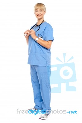 Casual Portrait Of A Confident Physician Standing Sideways Stock Photo