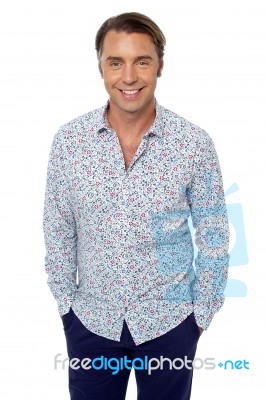 Casual Shot Of Smiling Handsome Relaxed Male Model Stock Photo