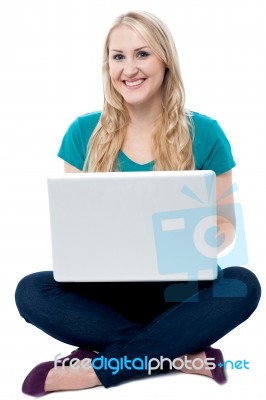 Casual Smiling Lady Working On Laptop Stock Photo