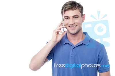 Casual Smiling Man Calling On The Phone Stock Photo