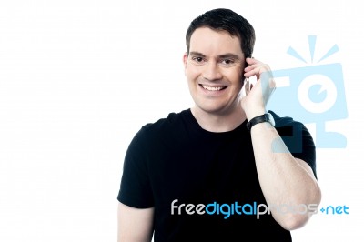 Casual Smiling Man Calling On The Phone Stock Photo