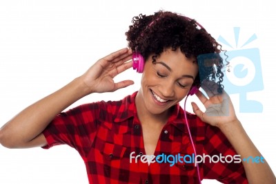 Casual Woman Lost In Pleasant Musical World Stock Photo