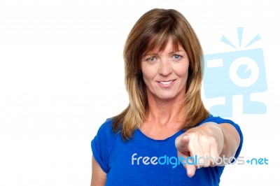 Casual Woman Pointing Towards You Stock Photo