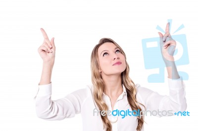 Casual Women Pointing Upwards Stock Photo